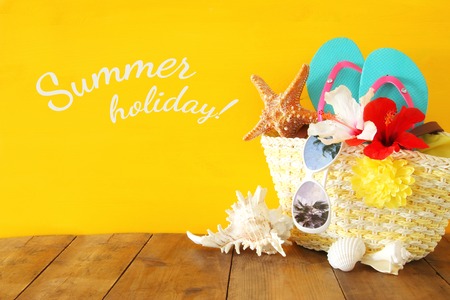 Beach objects on wooden table. Summer beach vacation concept.の写真素材