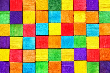 Top view of wooden colorful cubes.