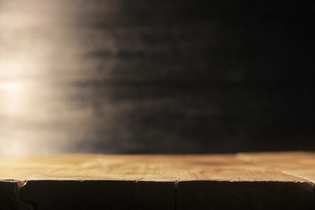 wooden table and blackboard background. Ready for product display montage.の写真素材