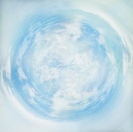 abstract swirled background of blue sky with clouds.