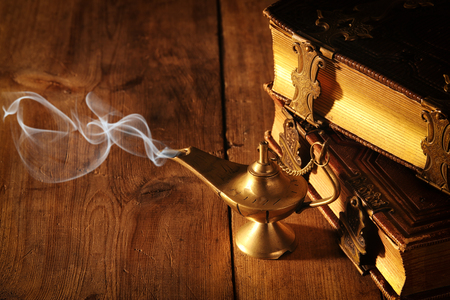 Image of magical aladdin lamp with smoke. Lamp of wishesの写真素材