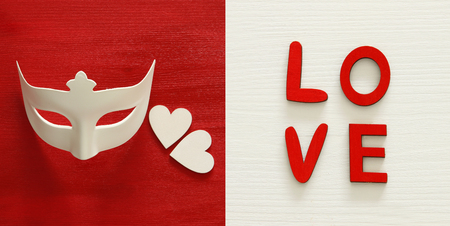 Valentines day background collage. White mask and red rose. Top viewの写真素材