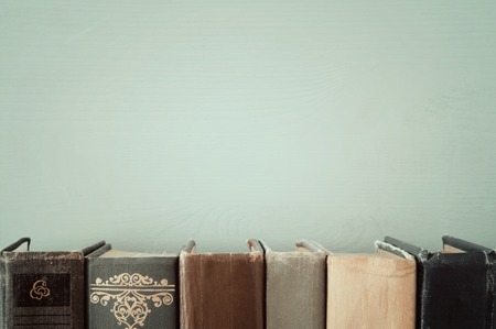 Old books on the shelf. retro filtered image. Copy spaceの写真素材