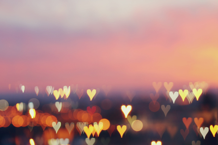Valentine's day romantic glitter bokeh background with many hearts lightsの写真素材