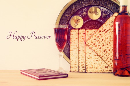 Pesah celebration concept (jewish Passover holiday). Traditional book with text in hebrew: Passover Haggadah (Passover Tale).の写真素材