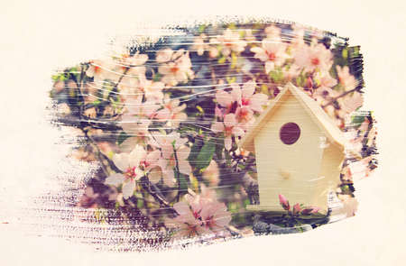 dreamy and abstract image of cherry tree. double exposure effect with watercolor brush stroke textureの写真素材