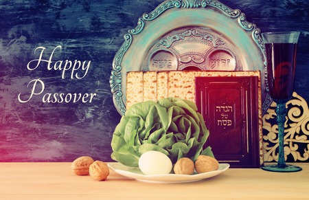 Pesah celebration concept (jewish Passover holiday). Traditional book with text in hebrew: Passover Haggadah (Passover Tale)の写真素材