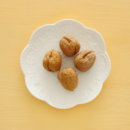 Walnuts top view. Jewish pesah celebration symbols (jewish Passover holiday)の写真素材