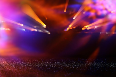 glitter vintage background. defocused. neon lights