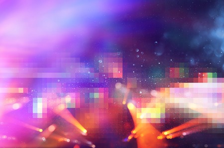 glitter vintage lights background. gold, blue, purple and black. de-focused