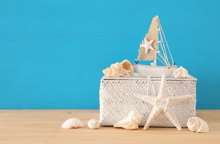 nautical, vacation and travel image with sea life style objects over wooden tableの写真素材