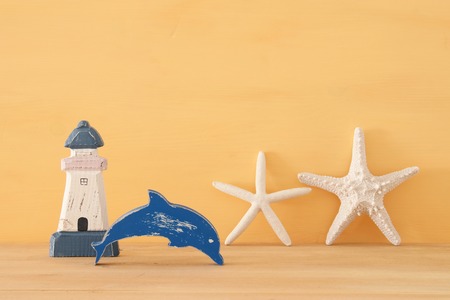 nautical, vacation and travel image with sea life style objects over wooden tableの写真素材
