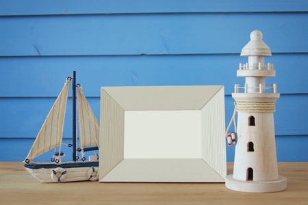 Nautical concept with sea life style objects on wooden table. For photography montage