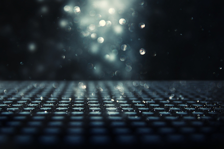 glitter vintage lights background. black, blue, silver and gold. de-focusedの写真素材