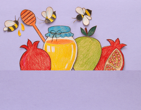 Rosh hashanah (jewish New Year holiday) concept. Traditional symbols shapes cut from paper and paintedの写真素材