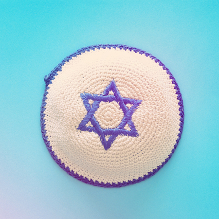 Top view image of jewish Kippah yarmulke (hat) with david star. holidays and shabbat conceptの写真素材