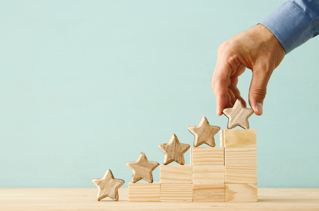 concept image of setting a five star goal. increase rating or ranking, evaluation and classification...