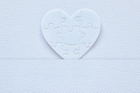 Top view image of paper white heart puzzle. Health care, donate, world heart day and world health day conceptの写真素材