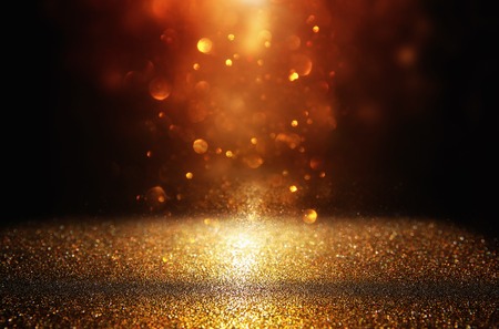 glitter vintage lights background. black and gold. de-focusedの写真素材