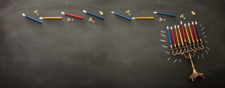 Banner of Jewish holiday Hanukkah background with traditional menorah (traditional candelabra) and burning candlesの写真素材