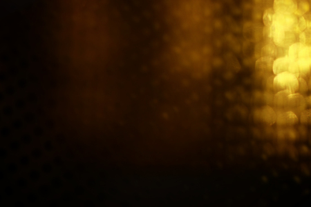 abstract background of gold bokeh lightsの写真素材