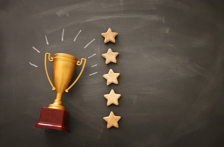 concept image of setting a five star goal. increase rating or ranking, evaluation and classification idea. Top view. Flat layの写真素材