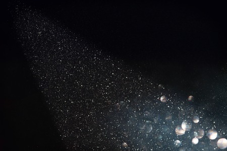 glitter vintage lights background. black and silver. de-focusedの写真素材