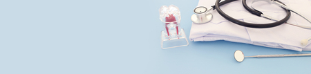 Dental care tools use for dentist in the clinic. Blue background.