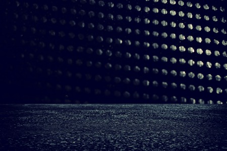 Spotlight over concrete floor. Dark black backgroundの写真素材