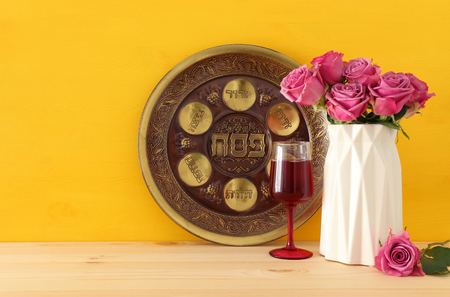 Pesah celebration concept (jewish Passover holiday). Translation for Hebrew Text horseradish,...