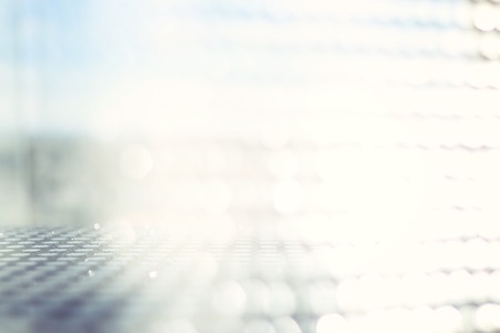 Photo white and silver glitter lights backgroundの写真素材