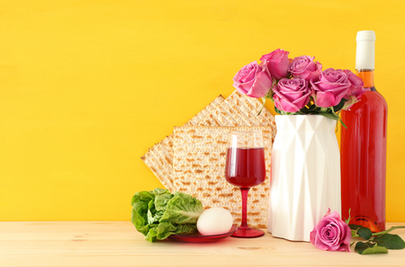 Pesah celebration concept (Jewish Passover holiday) over wooden tableの写真素材