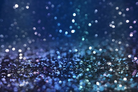 glitter vintage lights background. black, blue and silver. de-focusedの写真素材