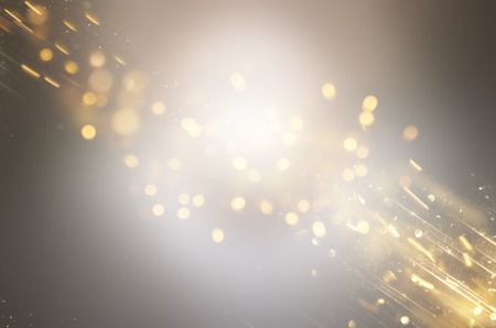 Abstract glitter silver and gild lights background. De-focused