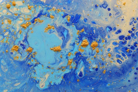 Abstract marbleized effect background. Blue creative colors. Beautiful paint with the addition of goldの写真素材