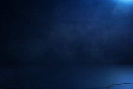 abstract dark concentrate floor scene with mist or fog, spotlight and displayの写真素材