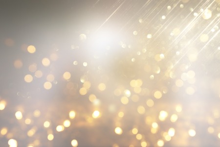 abstract glitter silver and gild lights background. de-focusedの写真素材
