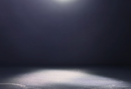 Abstract dark concentrate floor scene with mist or fog, spotlight and displayの写真素材