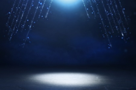 Abstract dark concentrate floor scene with mist or fog, spotlight, glitter light bokeh for displayの写真素材