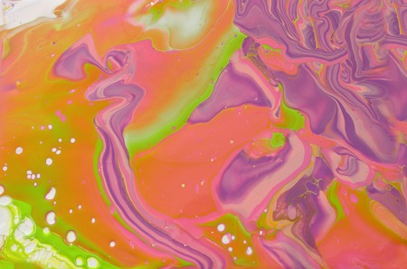 Photography of abstract marbleized effect background. Green, pink, orange and purple creative...