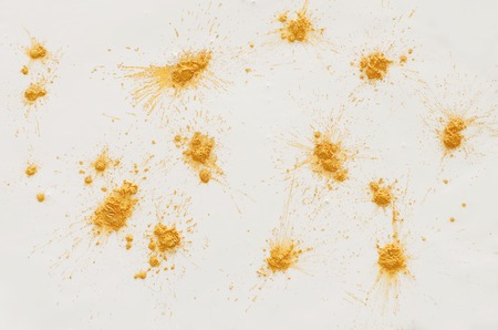 Abstract gold splashes effect backgroundの写真素材