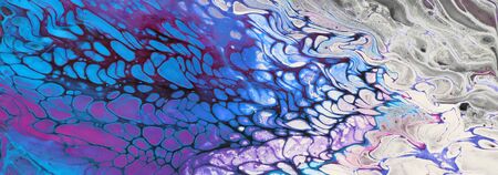 photography of abstract marbleized effect background. Blue, pink, purple and white creative colors....