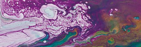 Photography of abstract marbleized effect background. Gold, white, purple and green creative colors....