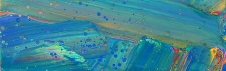photography of abstract marbleized effect background. Blue, mint and gold creative colors. Beautiful...