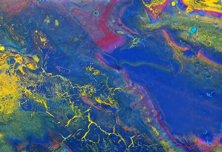 photography of abstract marbleized effect background. yellow, blue, purple and red creative colors....