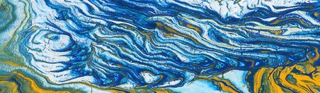 photography of abstract marbleized effect background. Blue, mint, yellow and white creative colors....