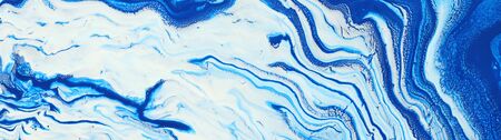 photography of abstract marbleized effect background. Blue and white creative colors. Beautiful paint. bannerの写真素材