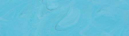 photography of abstract marbleized effect background. Blue colors. Beautiful paint. banner
