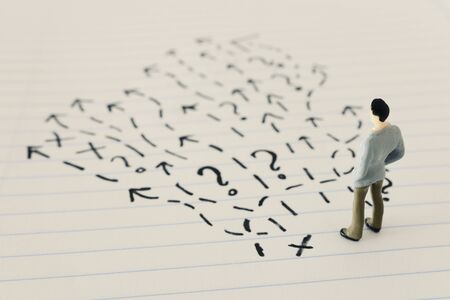business concept image of challenge. A man thinking about the best way to solve a problem