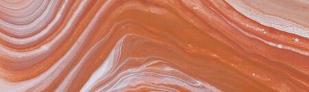 Photography of abstract marbleized effect background. Brown, orange, gray and white creative colors....